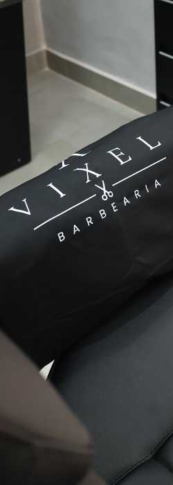 Toalha Vixel sobre a cadeira de barbeiro